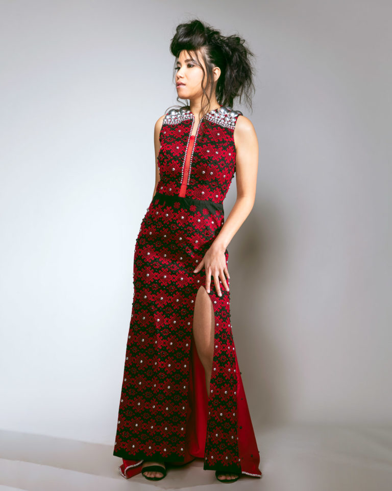 Young asian model in ethnic red dress for model portfolio